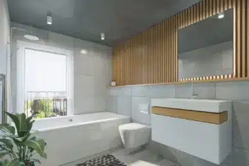 a bathroom with a toilet, sink, and bathtub